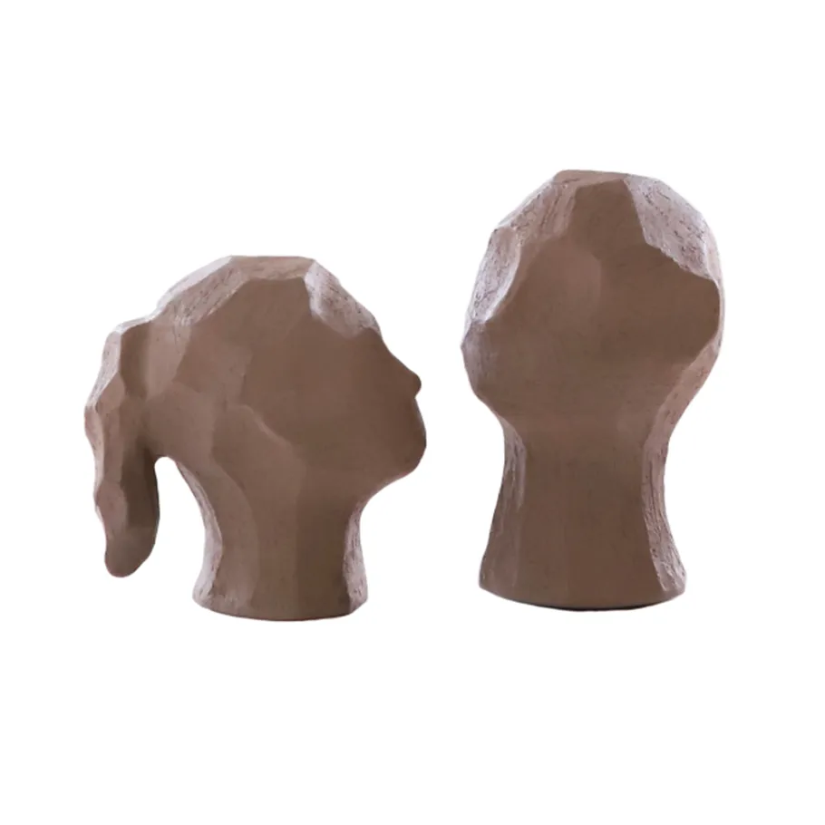 Escultura Benedict y Amal, Earth Cooee Design