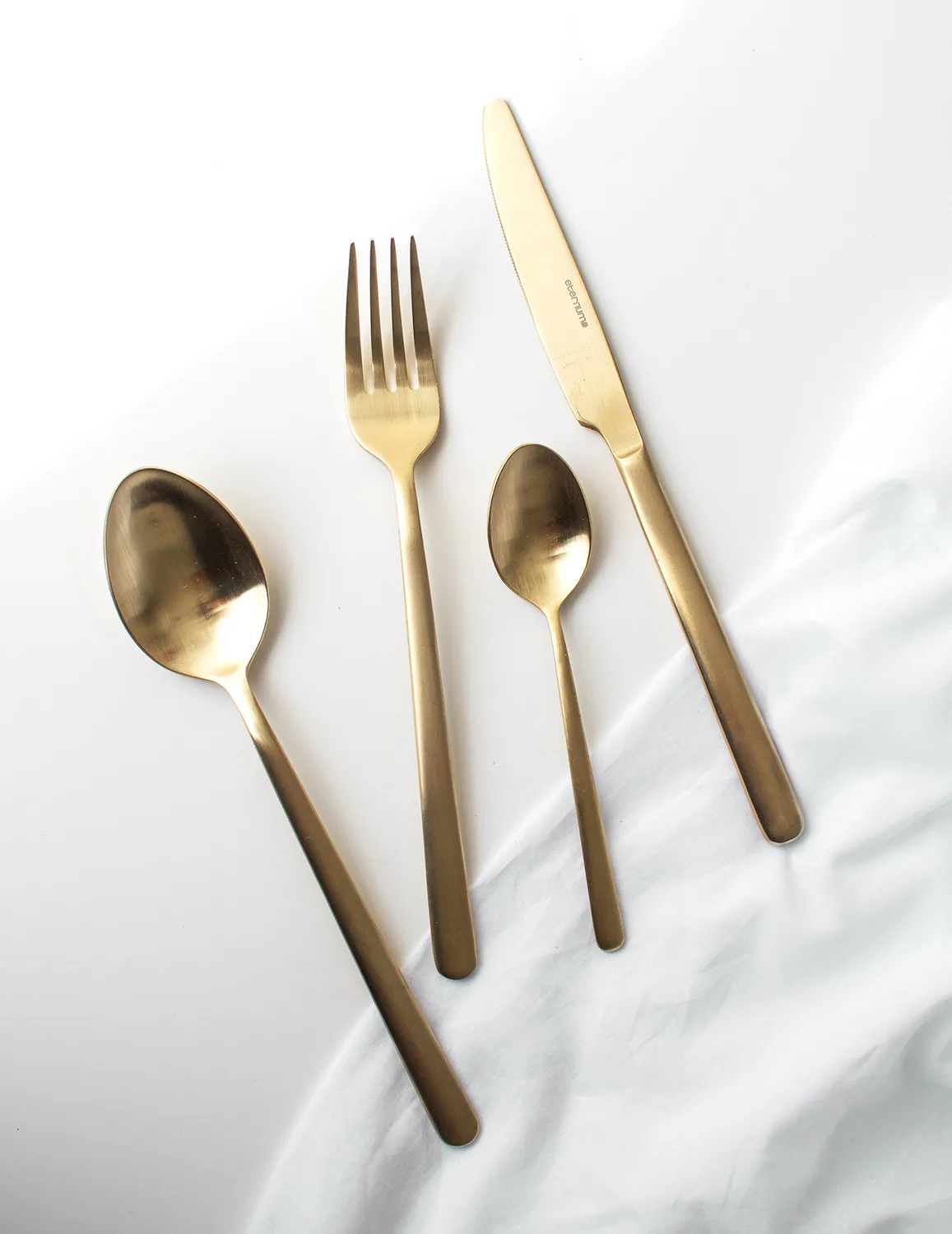 Set de cubiertos Eternum Nardo 16 piezas, Champagne Eternum