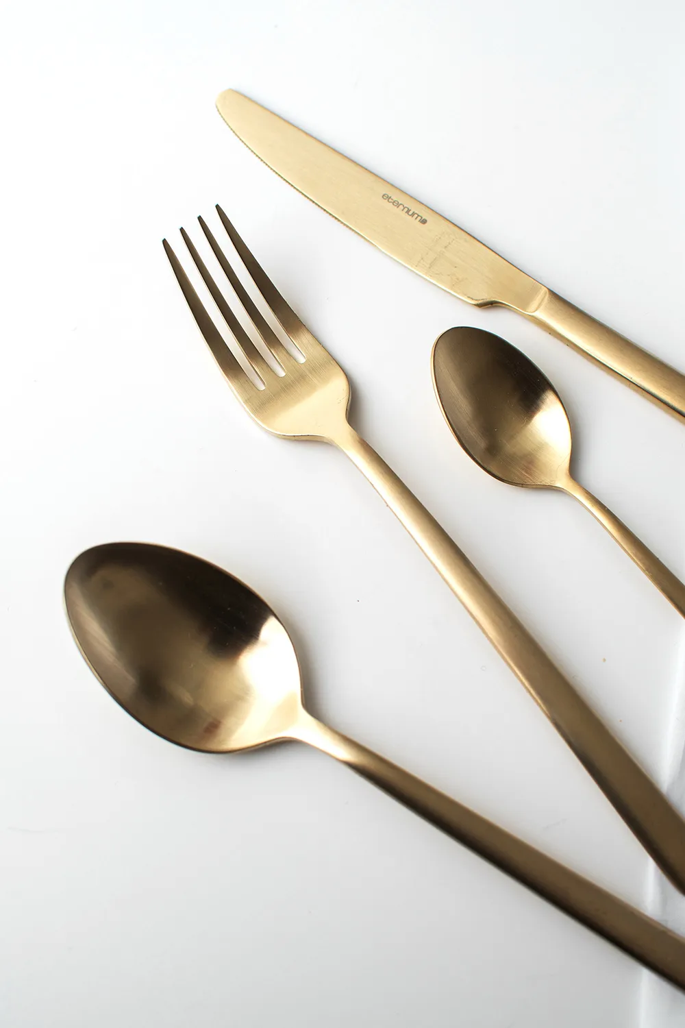 Set de cubiertos Eternum Nardo 16 piezas, Champagne Eternum