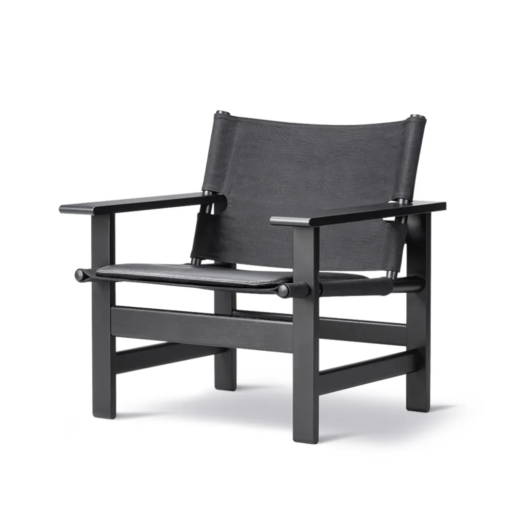 Butaca The Canvas Chair, Canvas negro - roble lacado negro, incl. cojín de cuero negro Fredericia Furniture