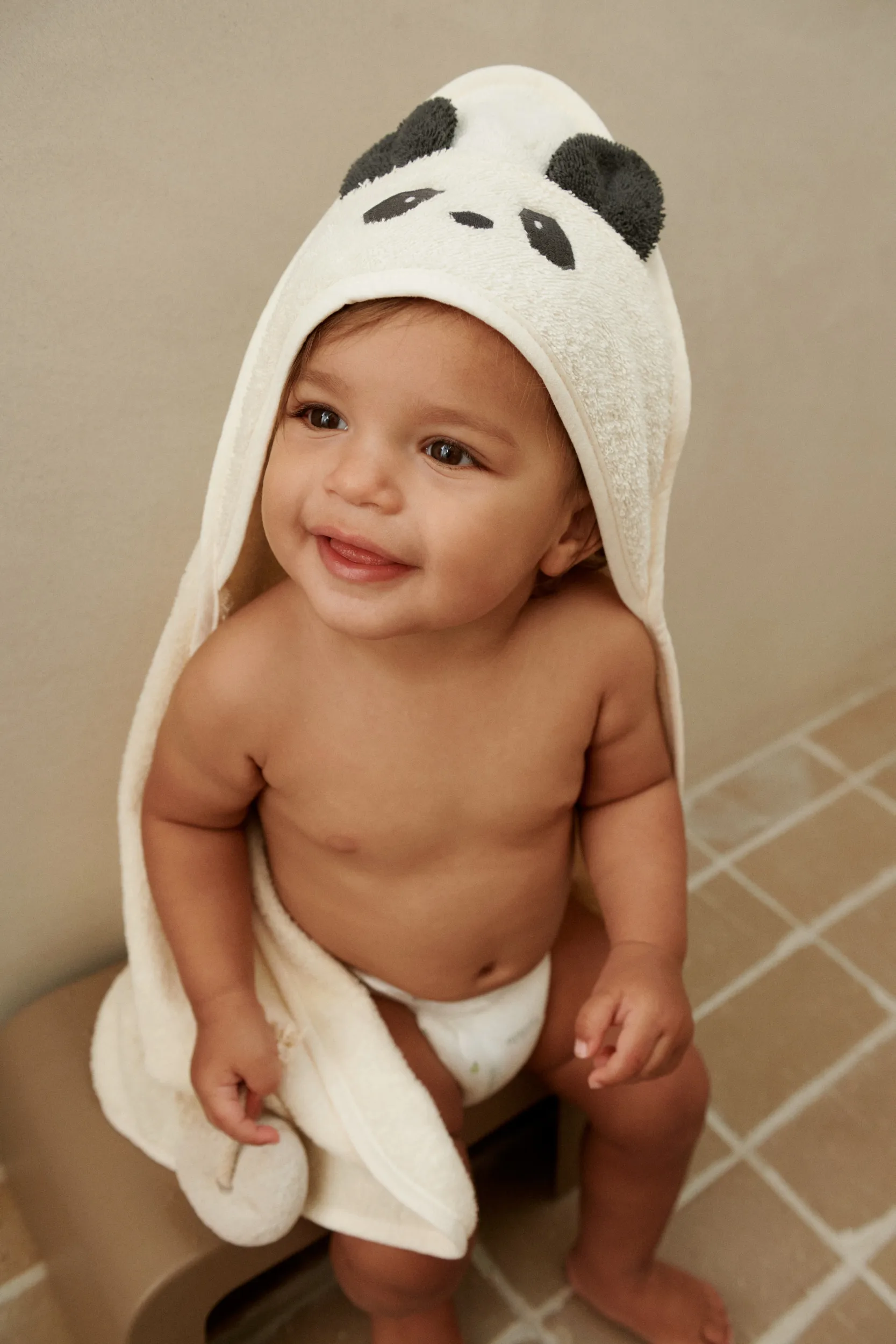 Toalla con capucha Albert 70x70 cm, Panda creme de la creme Liewood