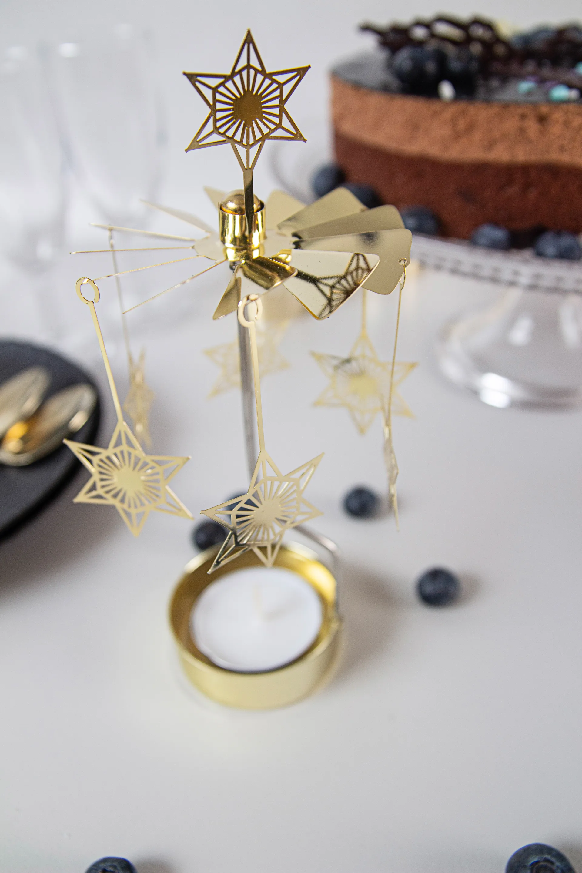 Portavelas giratorio Art Deco estrella, Dorado Pluto Design