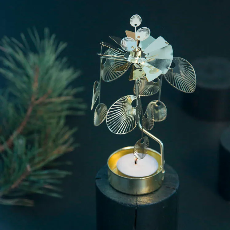 Portavelas giratorio Sun, Dorado Pluto Design