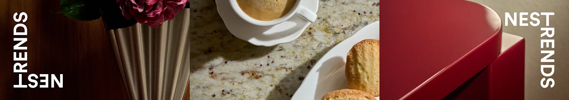Taza de café, magdalenas y una rosa en jarrón estriado sobre encimera moteada junto a caja roja con texto 'NEST TRENDS'.